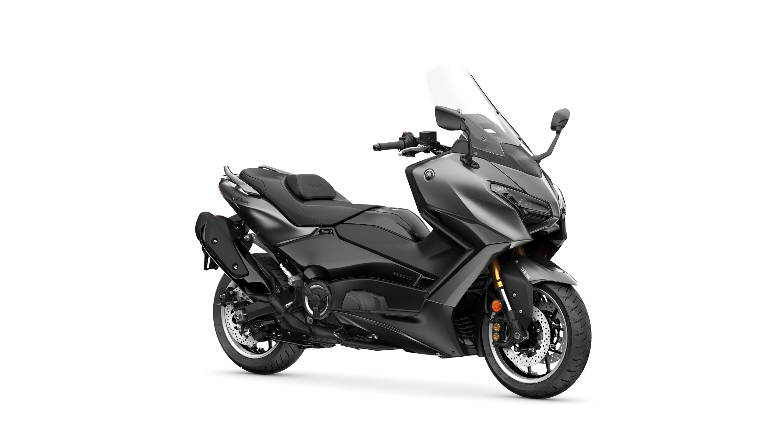 2026 Yamaha TMAX TECH MAX Crystal Graphite Lateral Right A sleek, modern touring motorcycle in matte black with a tall windshield, prominent fairings, and gold suspension components, angled to showcase its design and features.