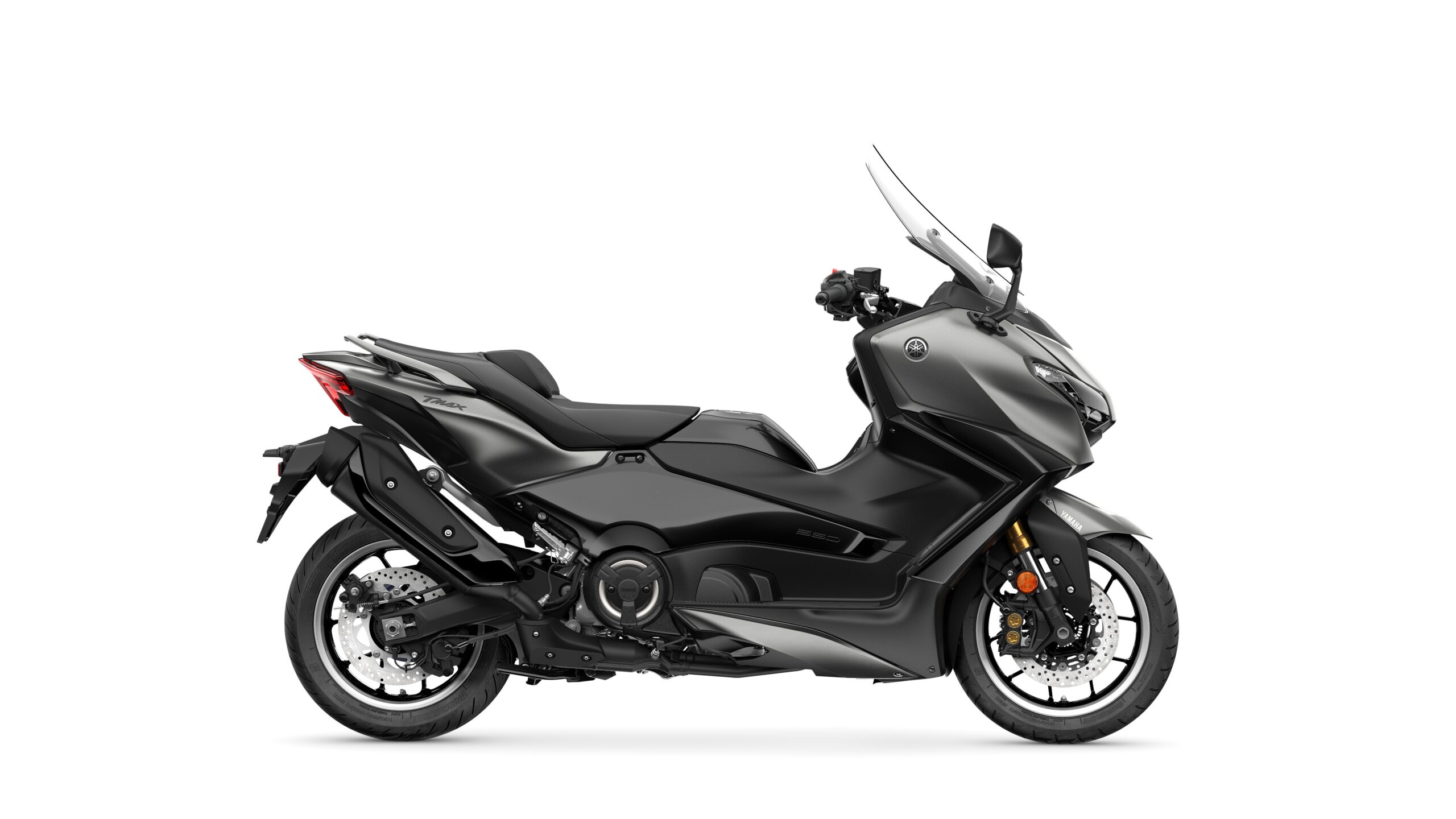 2026 Yamaha TMAX TECH MAX Crystal Graphite Right A sleek black scooter with a streamlined design, featuring a tall windshield, comfortable seating, and large wheels, positioned against a plain white background.