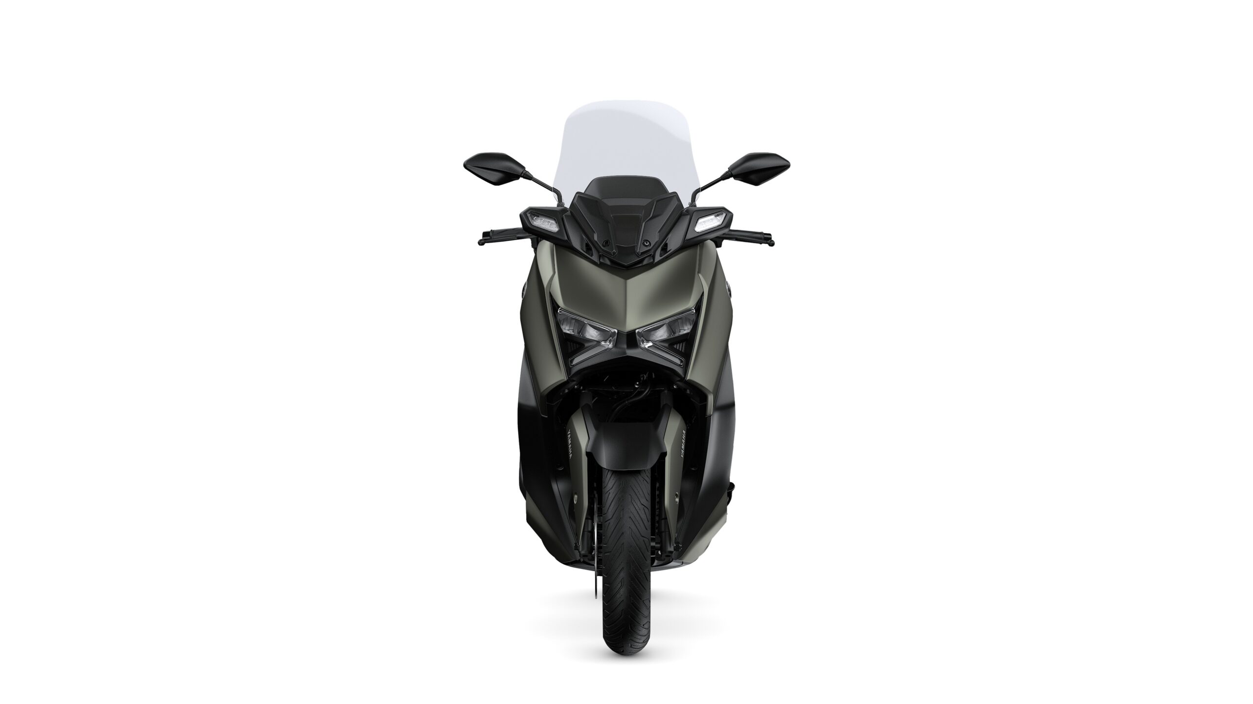 Yamaha 2026 XMAX 125 Tech Kamo Front A front view of a sleek, modern motorcycle with an aerodynamic design, featuring a dark color scheme, prominent headlights, and a tinted windshield.
