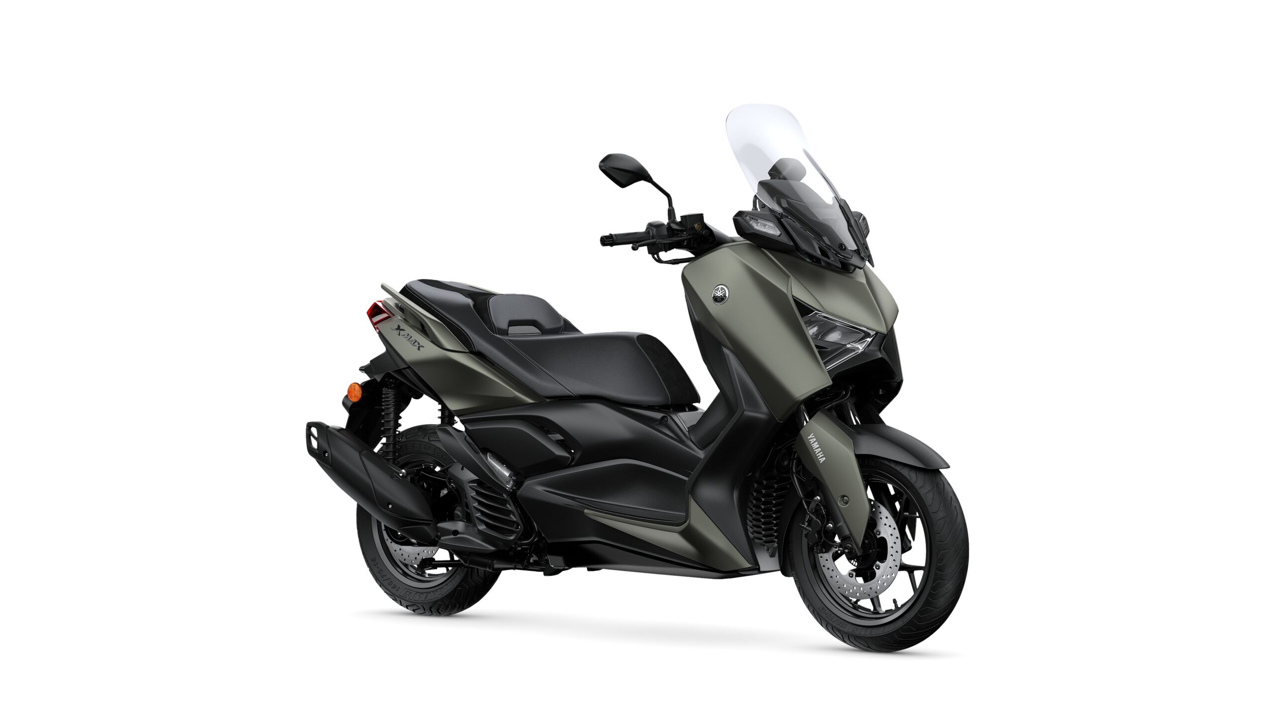 Yamaha 2026 XMAX 125 Tech Kamo Lateral Right Yamaha 2026 XMAX 125 A stylish gray scooter with a sleek design, featuring a large windscreen, comfortable seat, and modern details, positioned at an angled view on a white background.