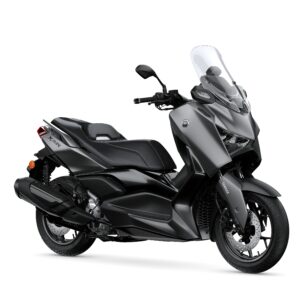 Yamaha 2026 XMAX 300 Tech MAX A sleek, modern scooter with a matte gray finish, featuring a tall windshield, comfortable seating, and sporty design elements, positioned against a white background.