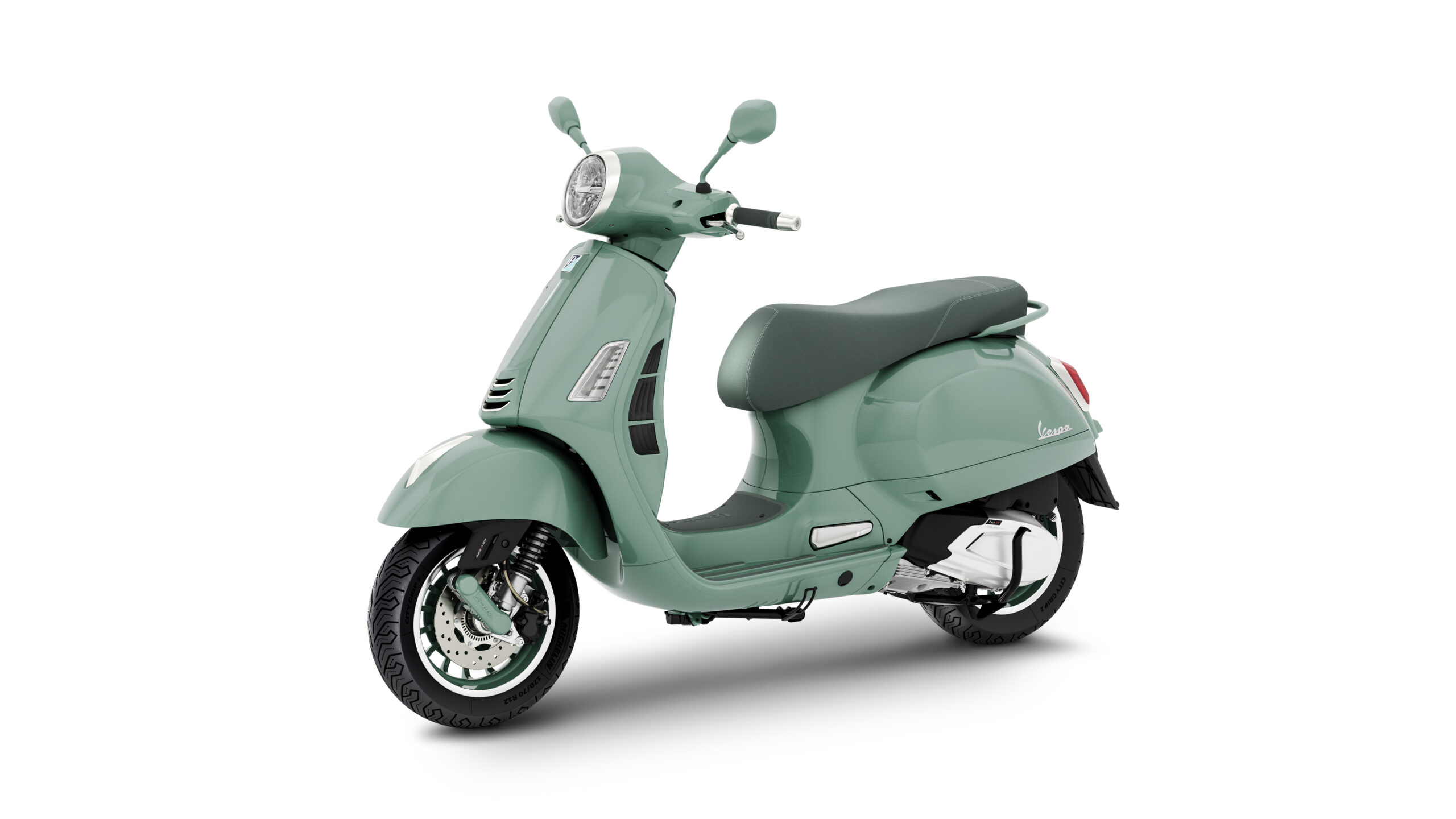 Vespa_GTS_310 cc_Livrea-80_3-4_ant_sx A mint green scooter with a classic design, featuring a round headlight, a single seat, and chrome accents, positioned at an angle to showcase its profile against a white background.