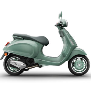 A mint green Vespa scooter displayed from the side, featuring a sleek design, black seat, and distinctive wheels.