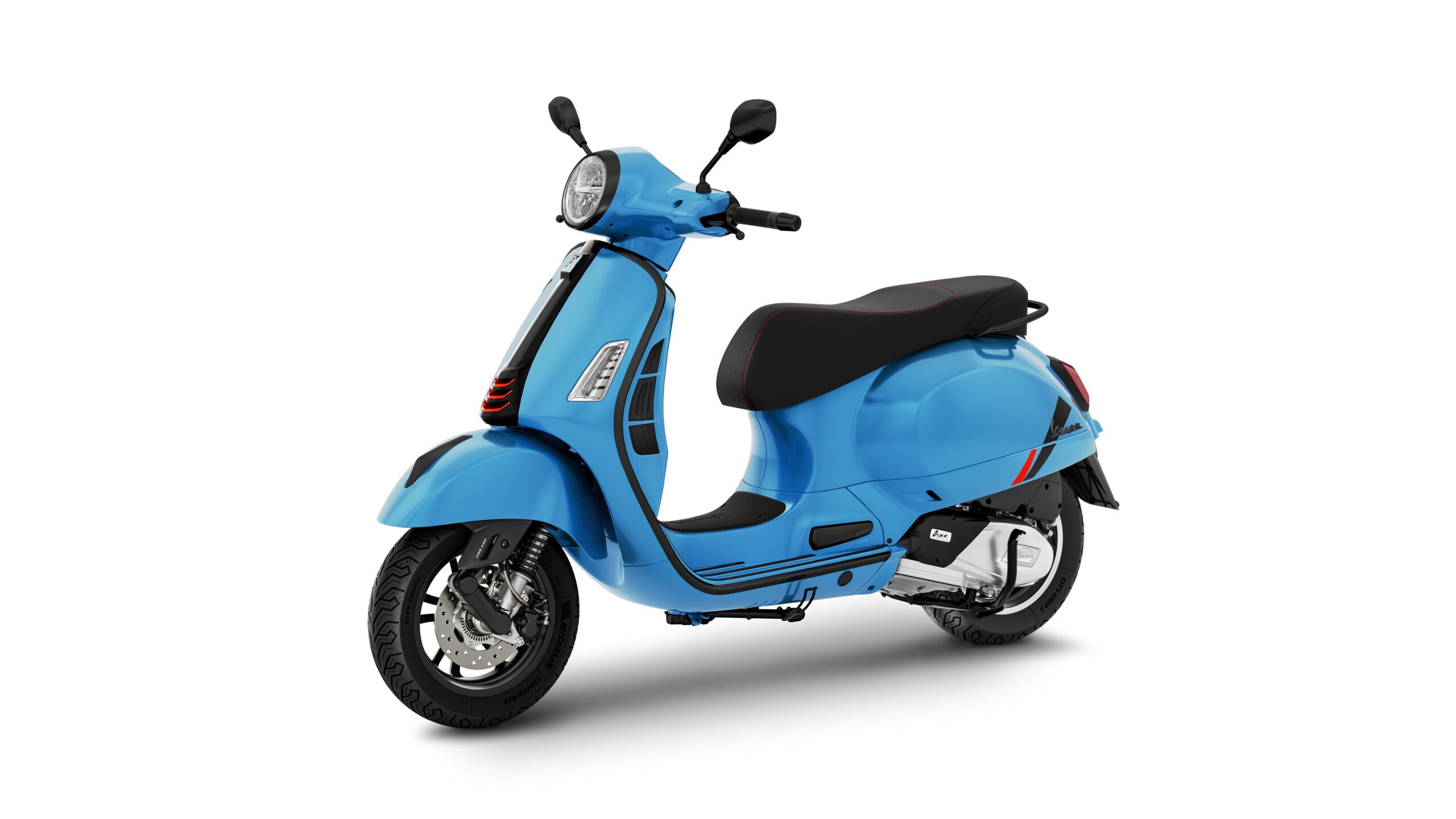 Vespa GTS 125 SuperSport Blu Eclettico Lateral Left A light blue scooter with a sleek design, featuring a rounded body, black seat, and chrome accents, positioned at a slight angle on a white background.