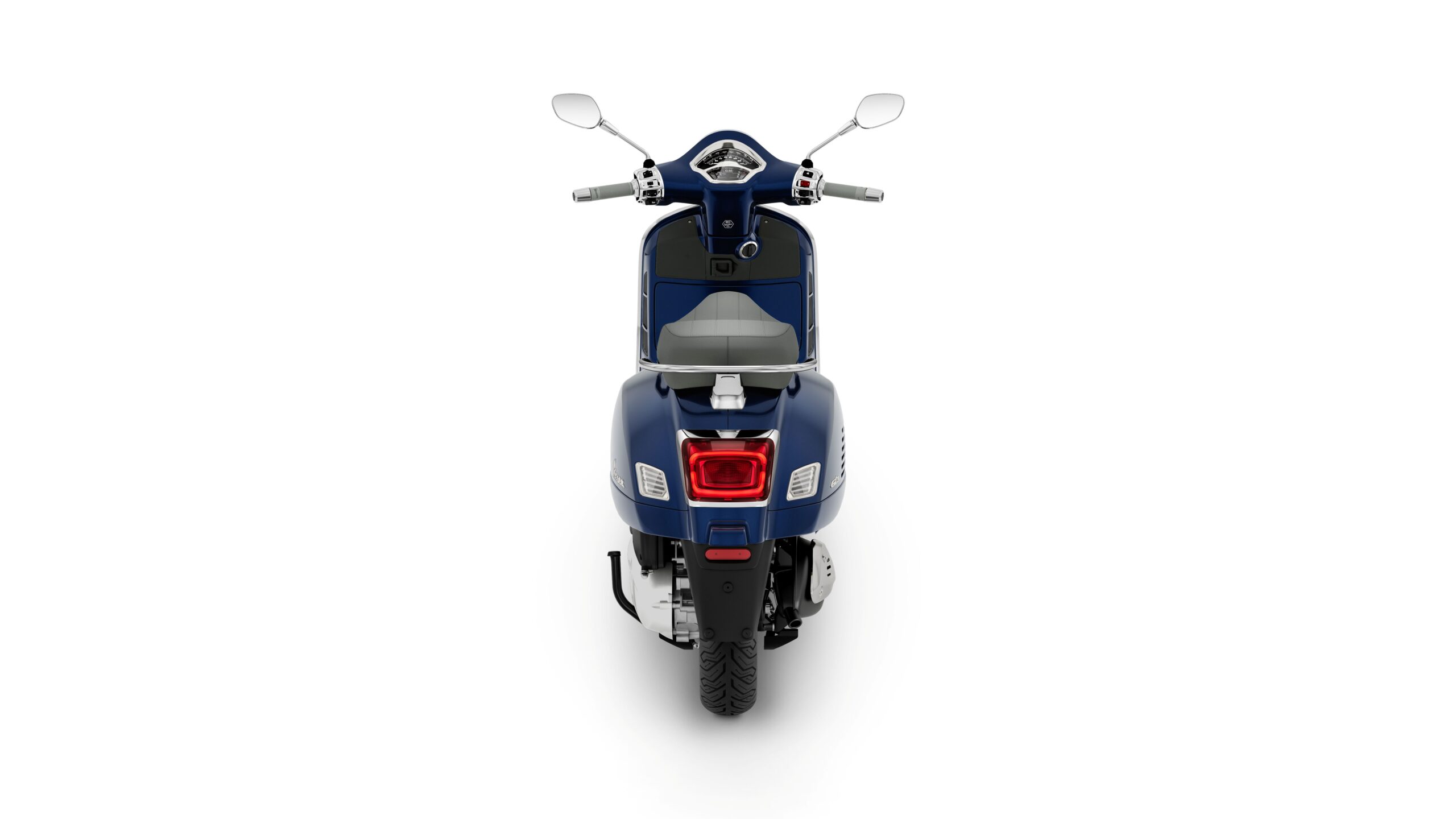 Vespa GTS 310 2026 Blu Energico Rear A blue scooter viewed from the rear, showcasing the tail light, seat, and handlebars.