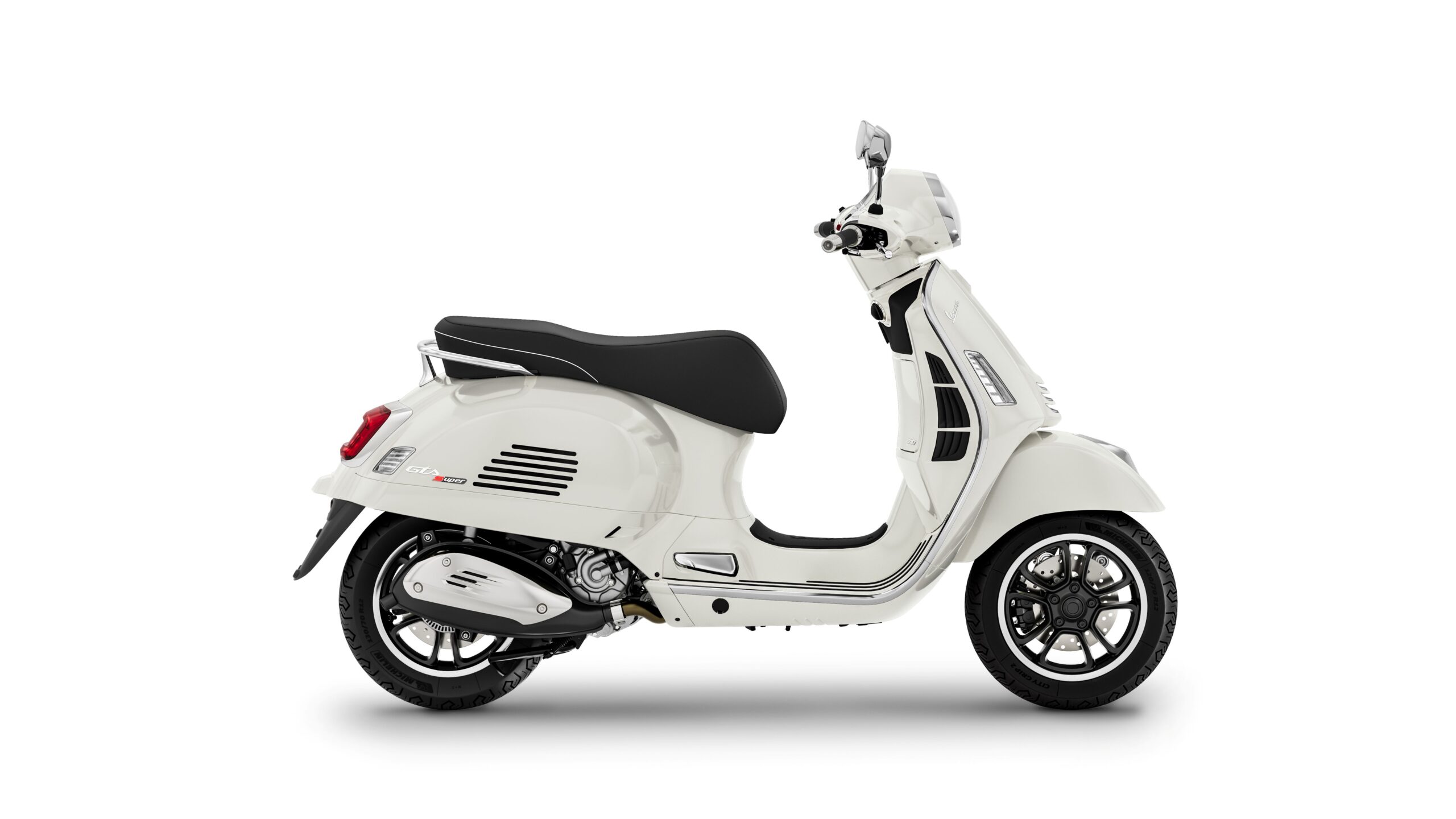 Vespa GTS Super 310 2026 Bianco Innocente Right A white Vespa scooter with a black seat, shown from the side, featuring a sleek design and modern components.