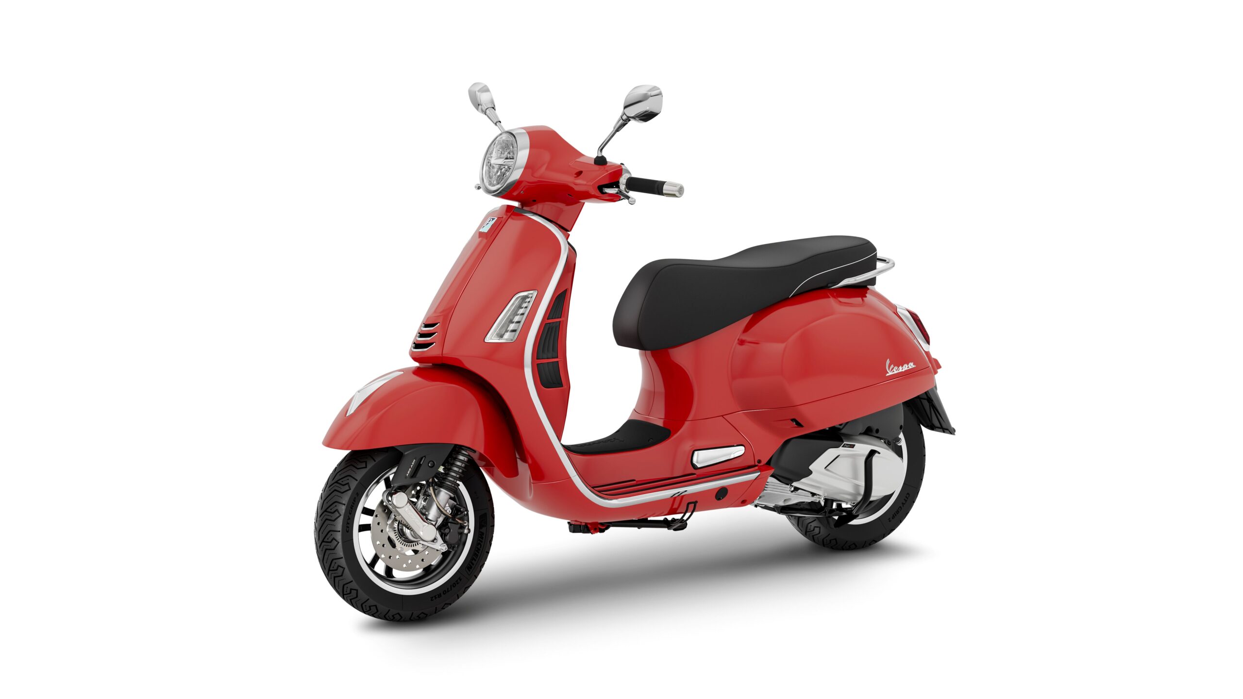 Vespa GTS Super 310 2026 Rosso Coraggioso Lateral Left A bright red scooter with a vintage design, featuring a rounded headlamp, a black seat, and chrome accents, positioned at a slight angle on a white background.