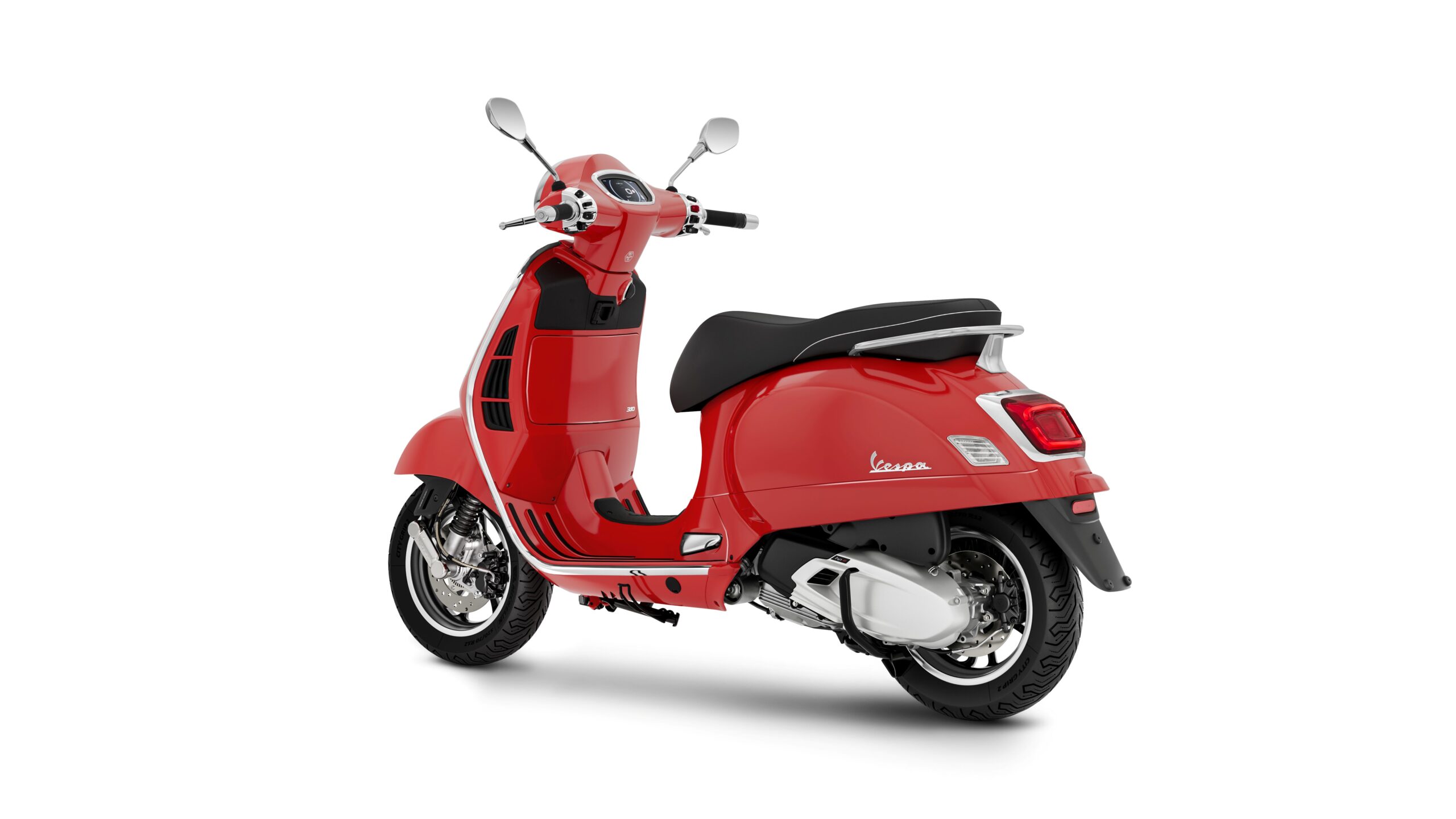 Vespa GTS Super 310 2026 Rosso Coraggioso Lateral Rear Left A red Vespa scooter viewed from the rear, showcasing its shiny body, sleek design, and chrome accents.