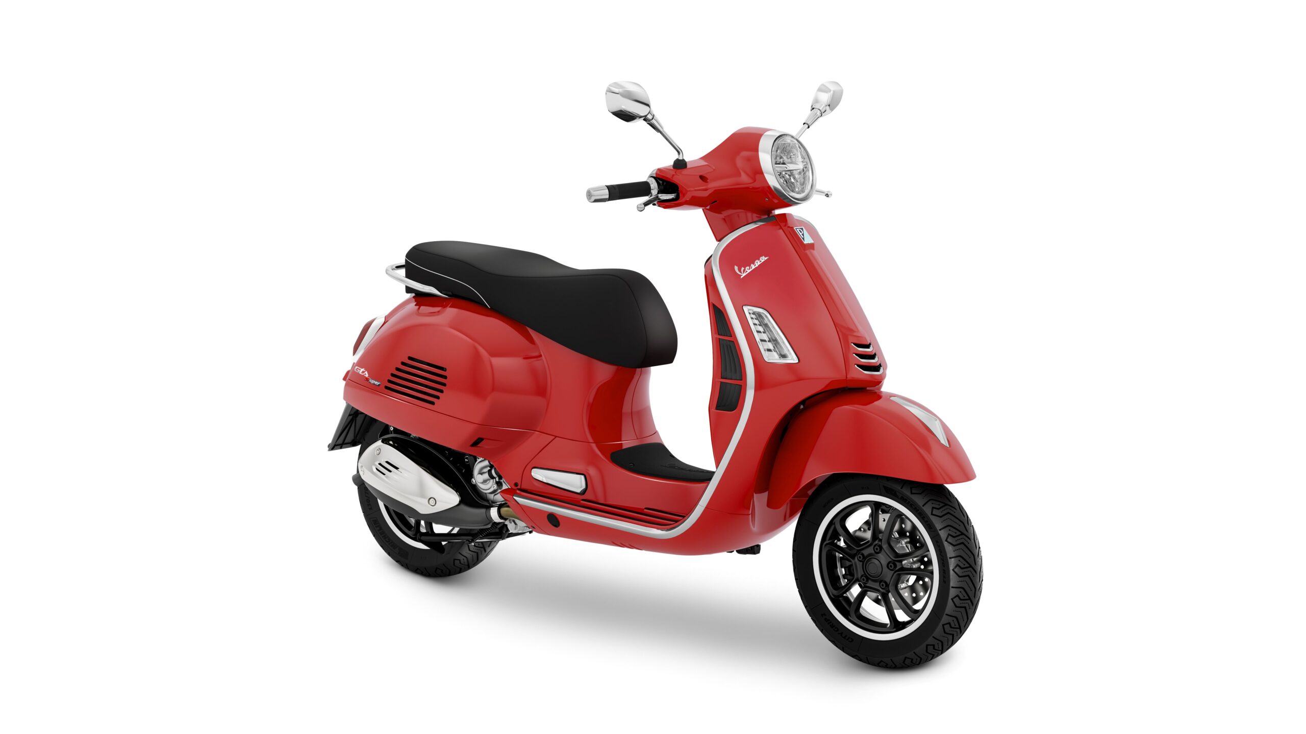 Vespa GTS Super 310 2026 Rosso Coraggioso Lateral Right A stylish red Vespa scooter with a black seat, displayed at an angle showing its front and side features, set against a white background.