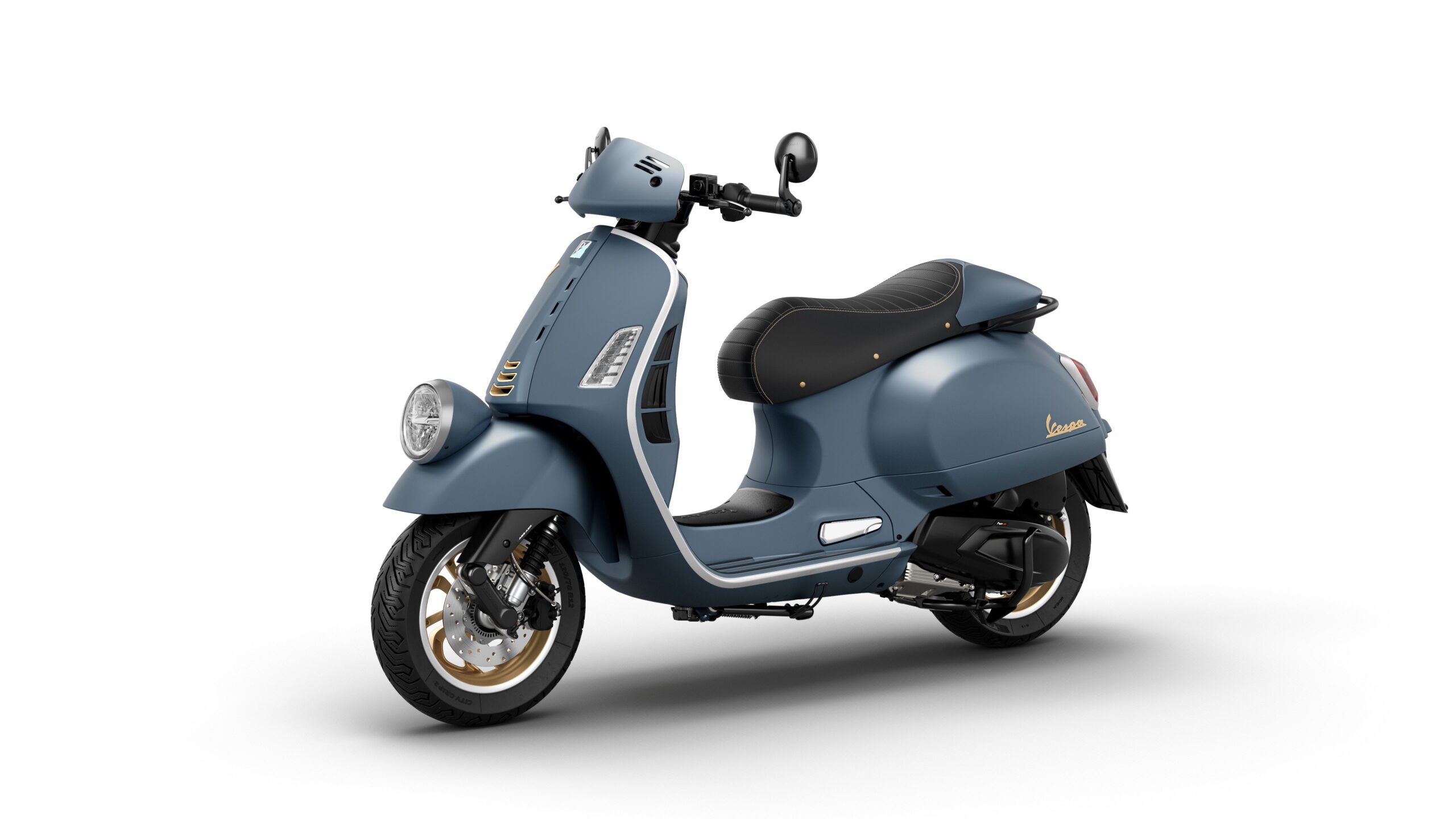 Vespa GTV 125 MY26 Officina Lateral Left A stylish blue scooter with a black seat, featuring gold accents and a vintage design, positioned at a slight angle against a white background.