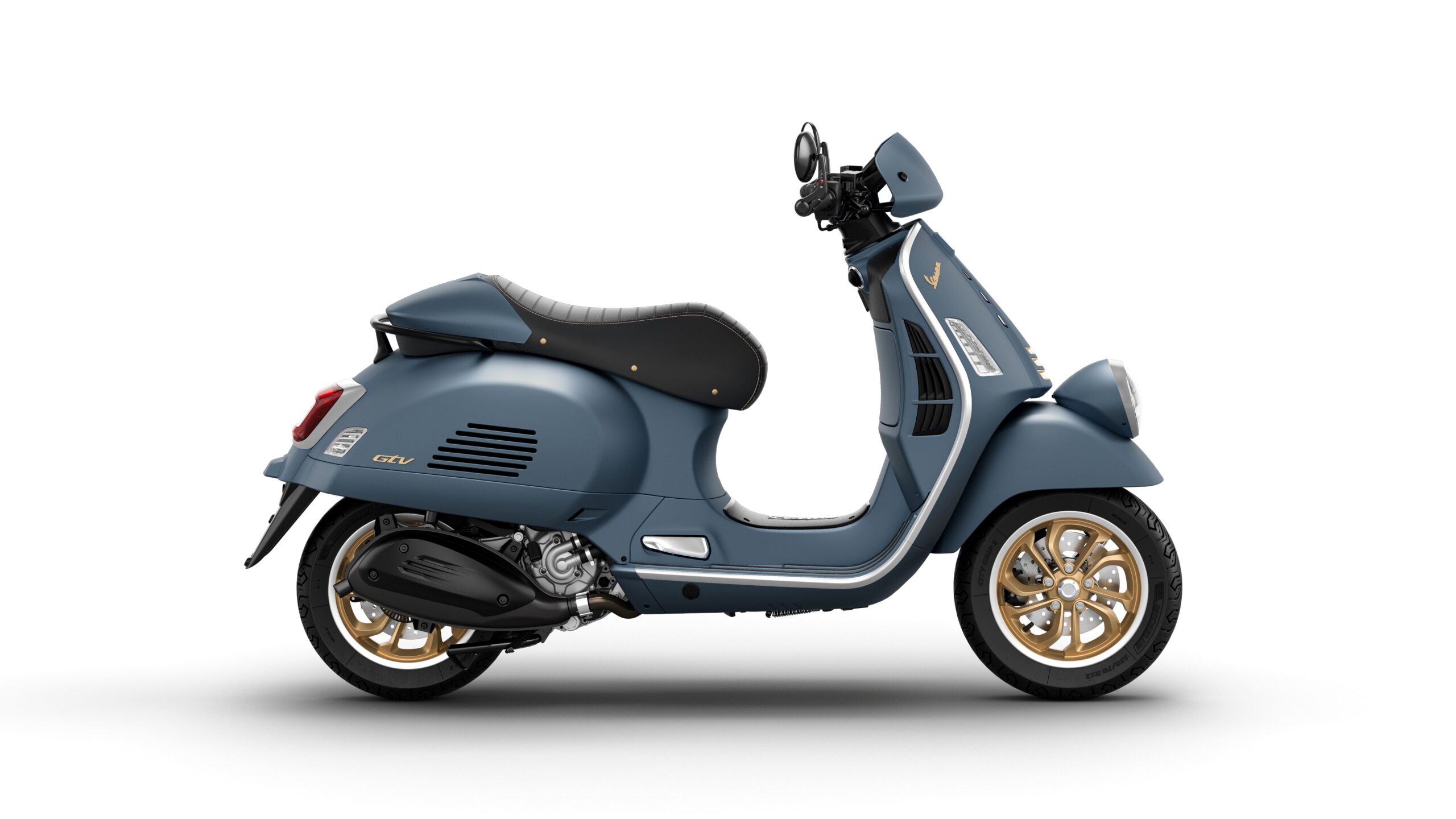 Vespa GTV 125 MY26 Officina Right A stylish blue Vespa scooter with gold rims and a black seat, viewed from the side.
